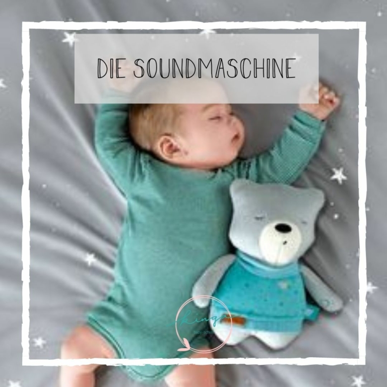 Schlafendes Baby mit Soundmaschine